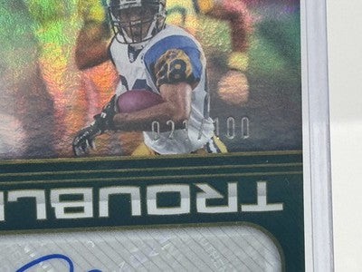 Isaac Bruce & Torry Holt Autos 021/100 2025 Panini Score Double Trouble Rams